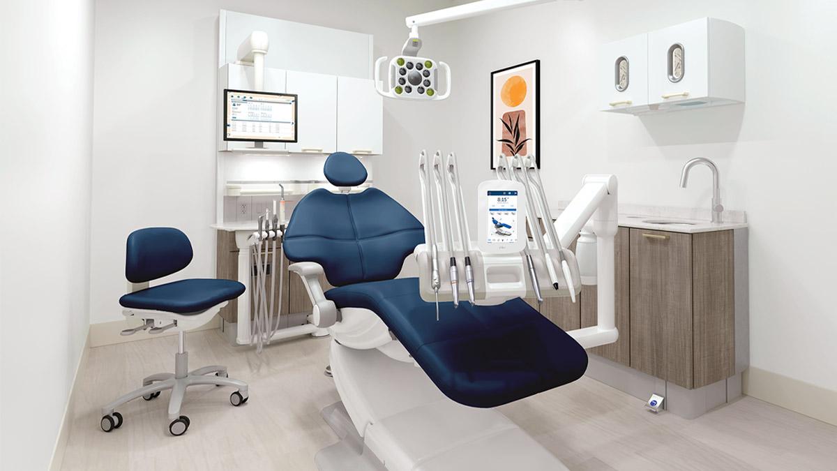 A-dec dental equipment and cabinets in a brightly lit dental operatory